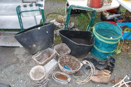 Size 7 work boots (hardly worn), three potato grow bags, cable, baskets, etc.