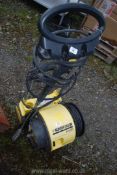 A K'archer pressure washer, K.50 model. (Motor ran at time of testing, pumping action not tested).
