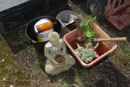 A Buddha, planters, glazed pot, galvanised mop bucket, hammers, etc.