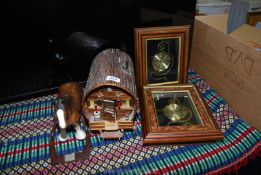 A pair of novelty clocks and a shire horse and gypsy caravan