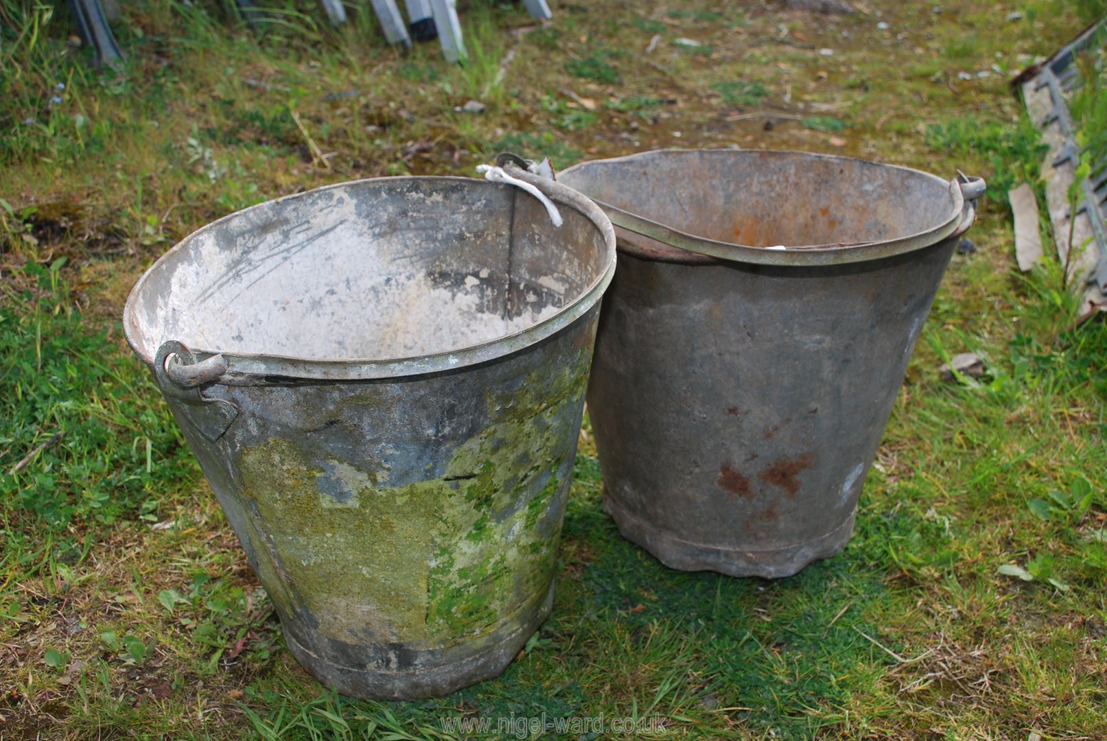 Two galvanised pails.