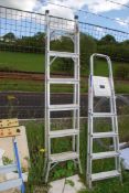 A five rung aluminium stepladder.