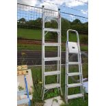 A five rung aluminium stepladder.