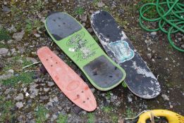 Three skate boards.
