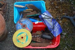 Two plastic boxes of tools including spanners, wedge, shelf bracket, 2 x 9" stone cutter discs, etc.