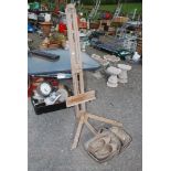 A trug, pair of wooden clogs and an easel.