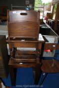 Two dark wood occasional tables and a magazine rack