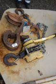 A chain monkey winch, rope pulley, and towing catch/hook.