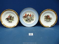 Three plates with hunting scenes.