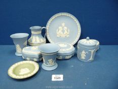 A small quantity of blue Wedgwood Jasperware including jugs, trinket pots, vases,