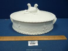 A Royal Worcester white doves Casserole Dish in basket weave pattern.