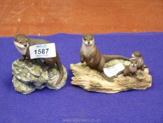 Two Border Fine Arts figures of otters; no.