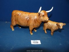 A Beswick Highland Cow and Calf.