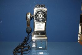 A chrome Telephone, 18 1/2'' tall.