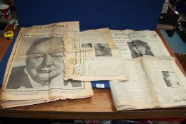 A small quantity of newspapers with articles of the death of Sir Winston Churchill.