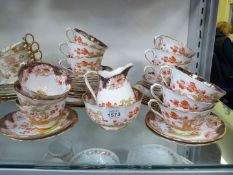 A Royal Albert Crown china 12 setting Teaset with oriental style decoration,