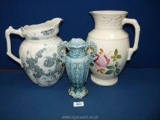 A blue and white Melrose Water jug plus another bedroomware jug a/f. and a small vase.