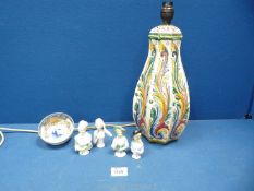 A large multi coloured china lamp base from Italy,