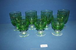 A matched set of seven hand blown Rosenthal glasses in the style of heavy rummers,