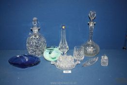 A small quantity of glass to include two decanters with stoppers, green mottled vase, cruet set,