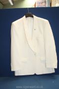 A white Dinner jacket by Moss Bros., size 44R.