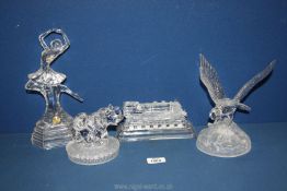 Four crystal glass ornaments including RCR ballerina, West German made train, eagle etc.