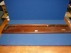 A hickory shafted Mashie Golf club circa 1923, on wooden 40'' long plinth.