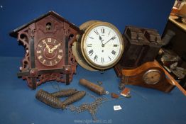 A Cuckoo clock with weights,