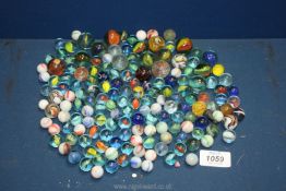 A quantity of small marbles (some mottled),
