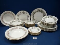 A quantity of Royal Worcester 'Lavinia' dinner ware including dinner plates (one chipped),