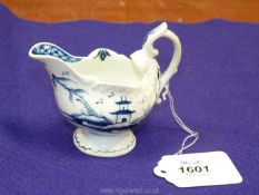 An early Derby porcelain blue and white cream boat circa 1760-70,