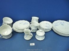 A German Mitterteich part Teaset in blue floral pattern including cups, saucers,