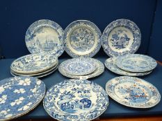 A quantity of blue and white plates including Spode, Masons, etc.
