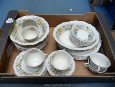A quantity of Royal Doulton Stratford dinner and tea ware to include dinner and side plates,