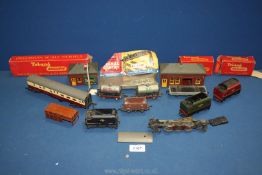 A quantity of Tri-ang '00' gauge stock including coach, cable wagon, Shell containers, station,