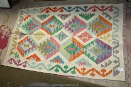 A Chobi Kelim Afghan rug, in cream and multi colours, 51" x 32".