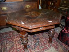 A continental flavour octagonal mixed woods occasional Table standing on turned legs,