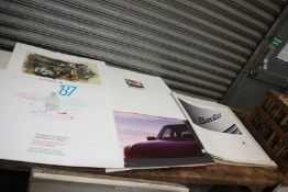 A quantity of Porsche Calendars from 1987, '88, '89 and '90, plus one other.