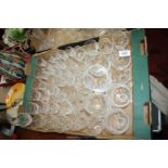 A large quantity of cut and etched mixed glasses including etched custard cup, brandy glasses,