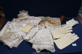 A small quantity of linen including lace doilies, embroidered pillowcase,