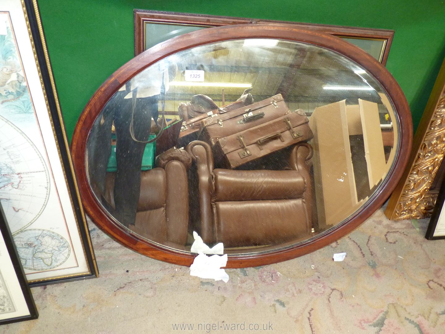 A darkwood framed bevelled edge Mirror, 32'' x 23''.