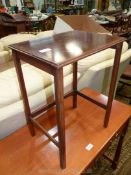 A Mahogany occasional Table having a cross-banded and lightwood strung top,
