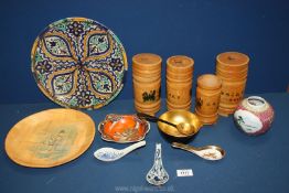 A box of miscellanea including oriental wooden canisters, bowls,