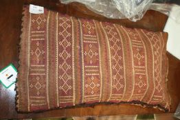 A vintage Sumak Afghan saddle bag in brown and burgundy colours, 34" x 20".