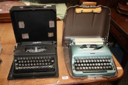 Two cased typewriters 'Japy' and 'Imperial'.