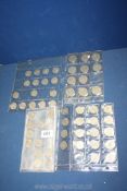 A quantity of pre decimal coins in sleeves including florins and shillings, etc.