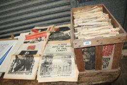 A quantity of 1970's ''New Musical Express'' newspapers, in wooden crate.