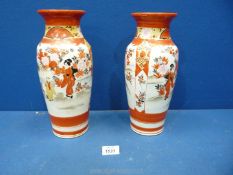 A pair of Japanese vases with birds, people and flowers on orange and white ground (marks to base).