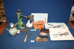 A quantity of miscellanea including chopping board, two mincers, travel iron, cork screw,