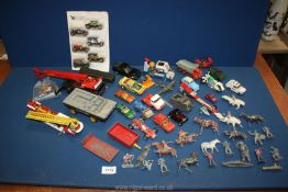 A tray of toy cars to include Corgi and Matchbox models and metal Cowboys and Indians etc.